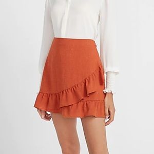 High waisted orange mini skirt